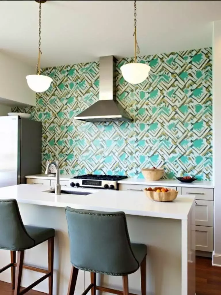 Kitchen with bold geometric wallpaper accent wall