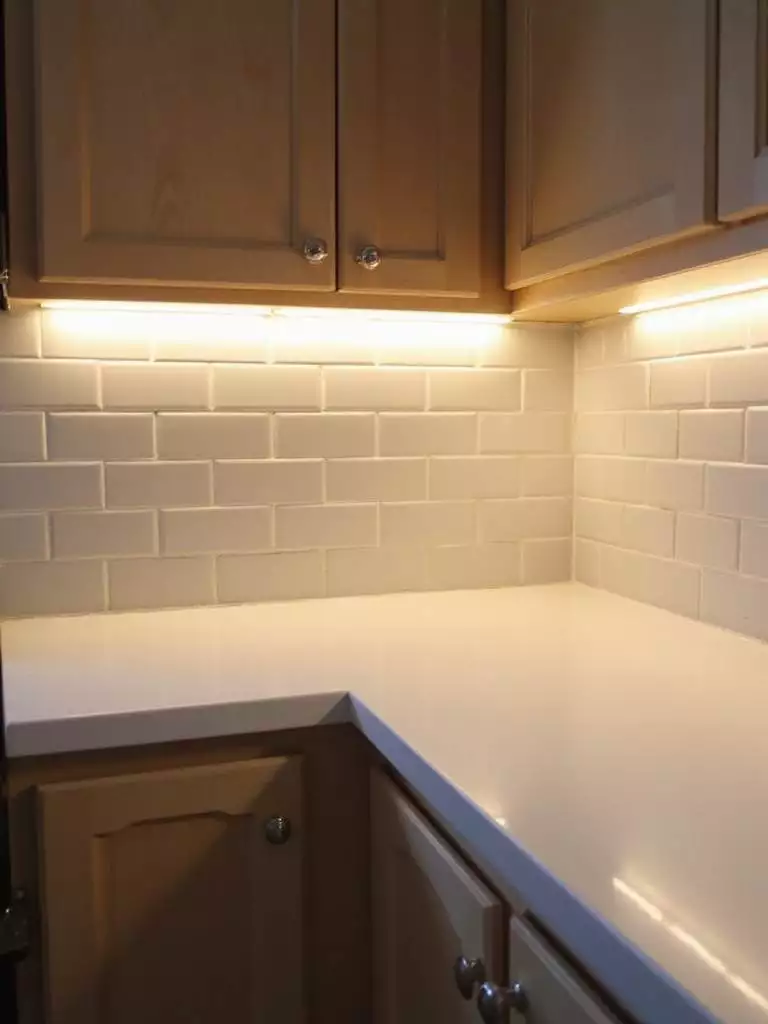 Well-lit kitchen countertop illuminated by under-cabinet LED lighting, showcasing the functionality and aesthetic appeal.