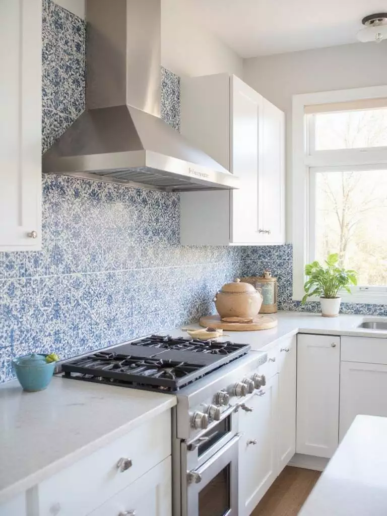 Modern kitchen with intricate cement tile backsplash