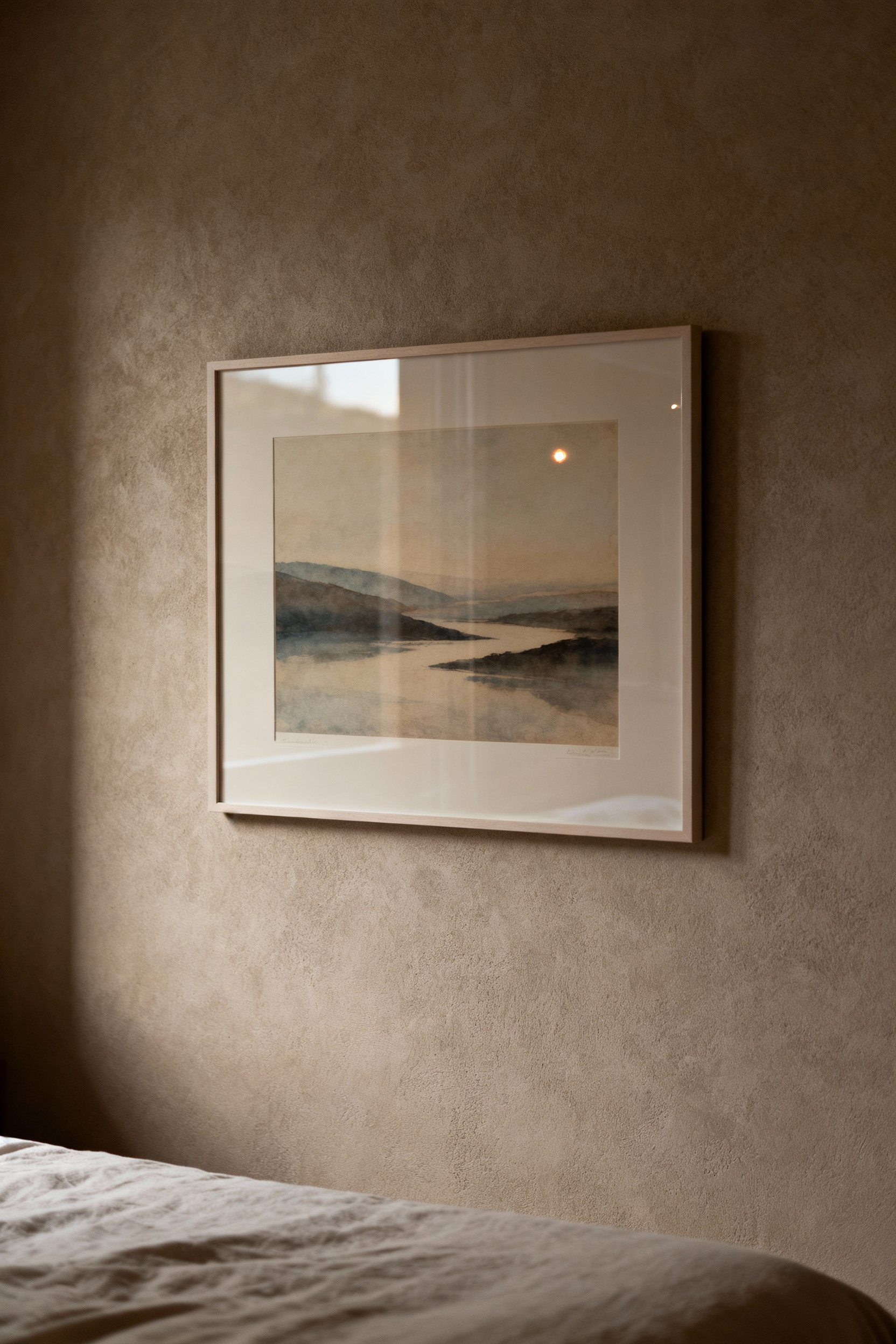 Close-up of a framed art print showcasing vibrant colors that defy fading, symbolizing long-lasting art print preservation in a bedroom setting.